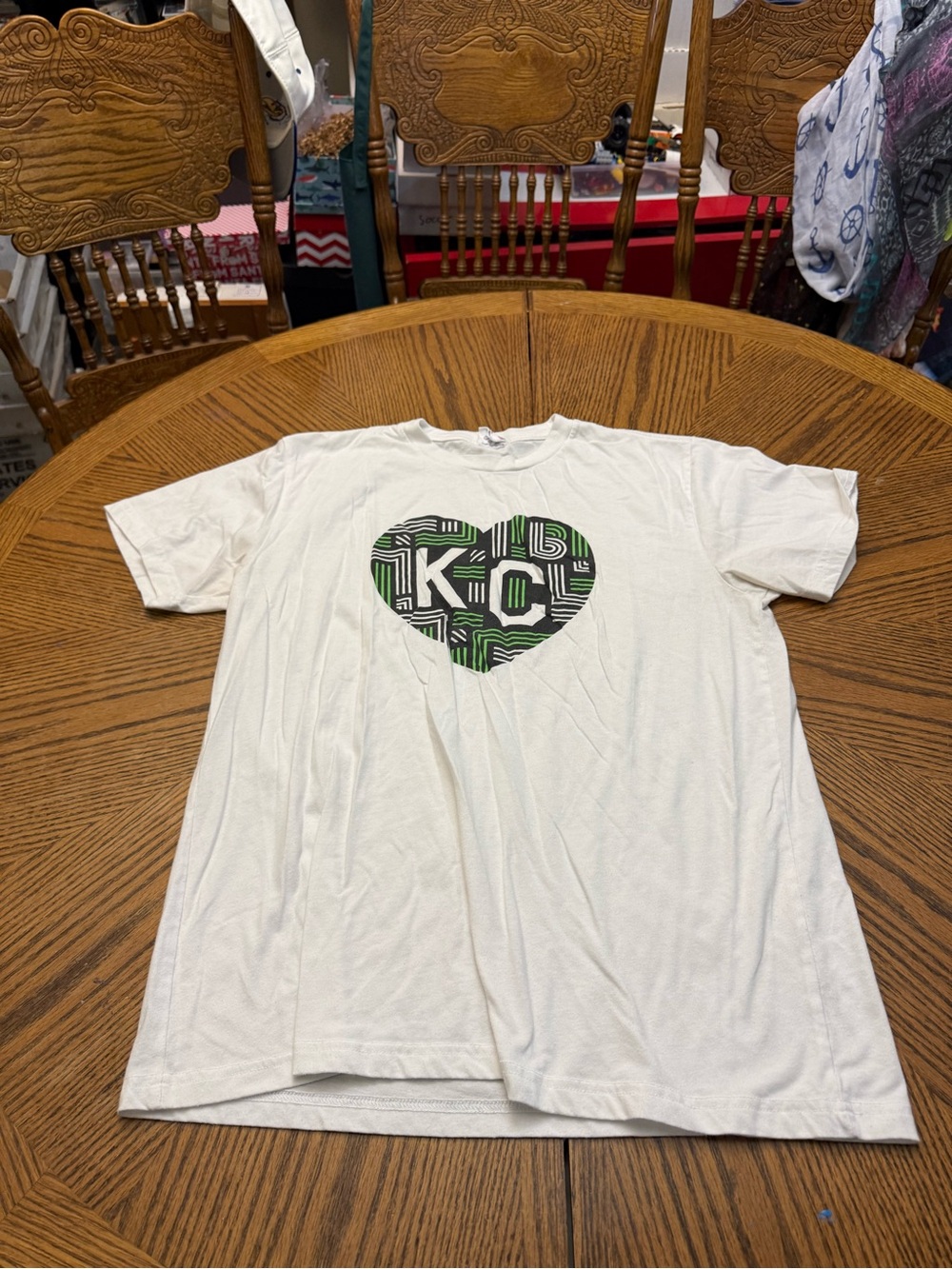 Charlie Hustle KC Heart White Short Sleeve Tee with Green & Black Heart Graphic